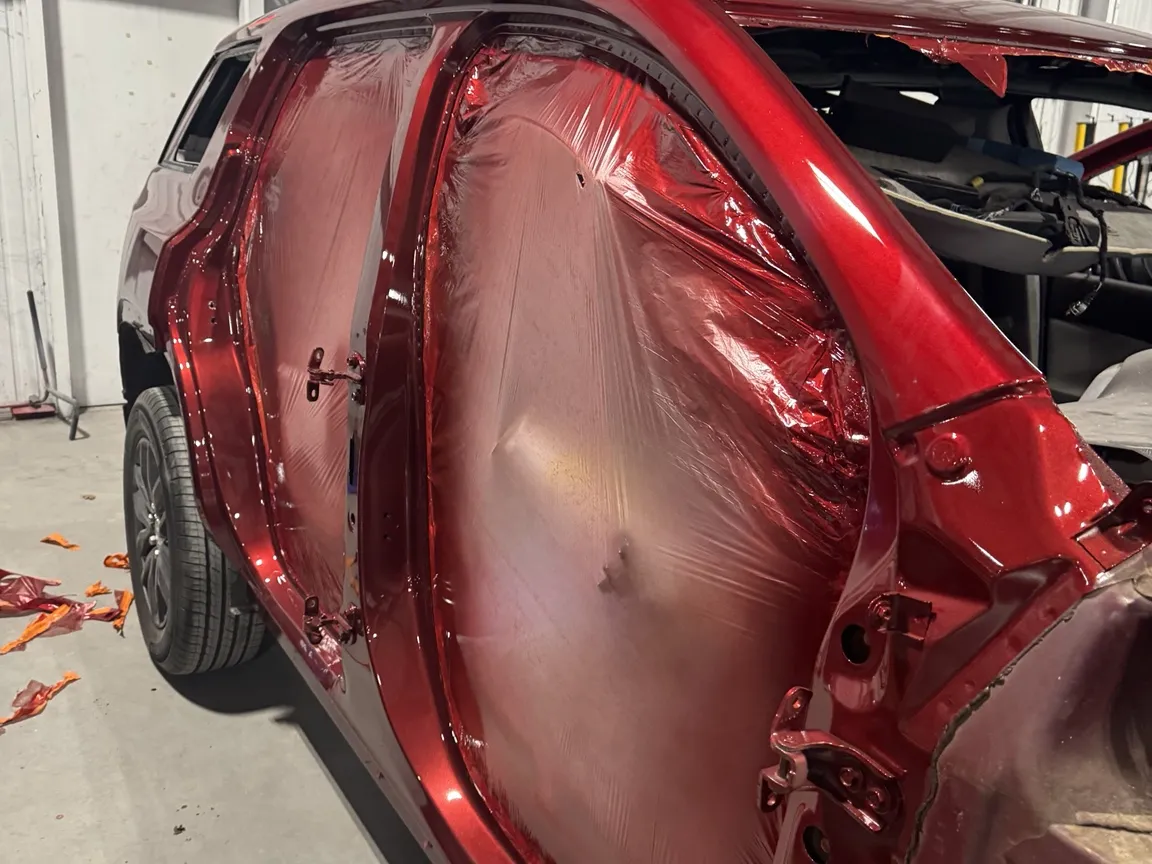 Vehicle masked and prepared for paint work at Prime CRS