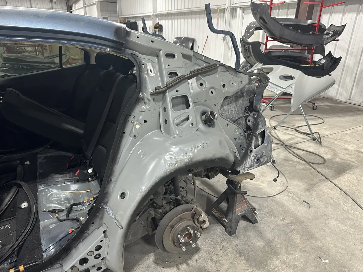 Structural repair on a disassembled vehicle at Prime CRS